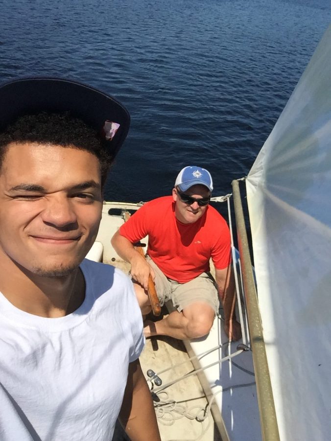 Captain Aaron and Edwin the First Mate. FWIW, it's hard to take a photo of sailing a boat that you are currently sailing.
