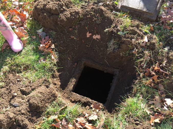 I wish I had a picture of me going down the hole - it's small enough that I have to raise my arms above my head to get in there.