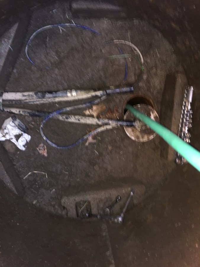 And just because I care about my readers, here's a blurry picture of the inside of the well by the cap.